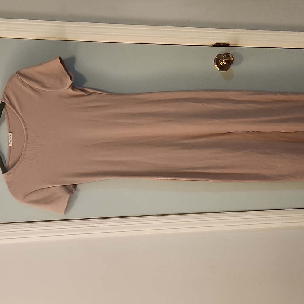 Tan color long straight dress with slit  on the front.